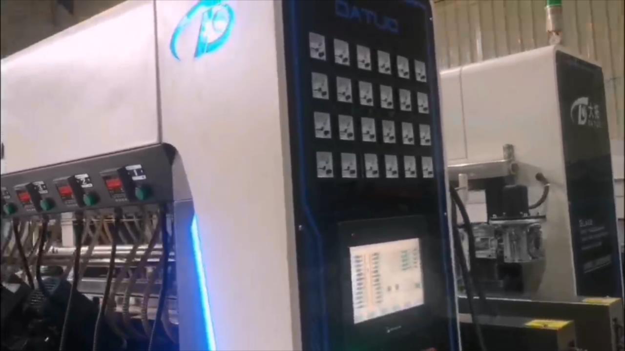 Single machine for double-sided edge grinding of glass